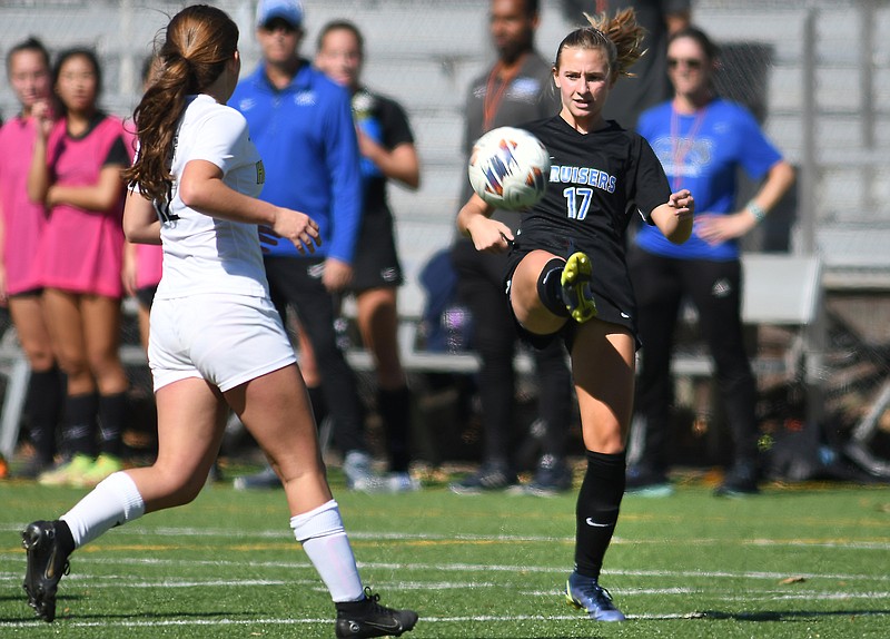 Staff photo by Robin Rudd / GPS senior forward Sasha Carbone (17) kicks the ball into Hutchison's zone during a TSSAA Division II-AA soccer state semifinal Thursday at Chattanooga Christian School. Carbone had the winning goal in the Bruisers' 2-1 overtime victory.