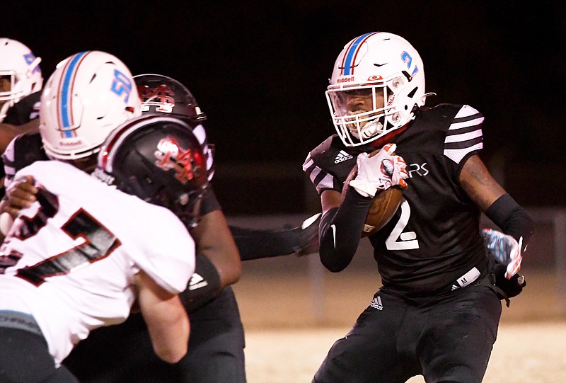 Staff photo by Robin Rudd / Brainerd's Cameron Sanders (2) looks for running room during Thursday night's home game against Region 3-3A opponent Signal Mountain.