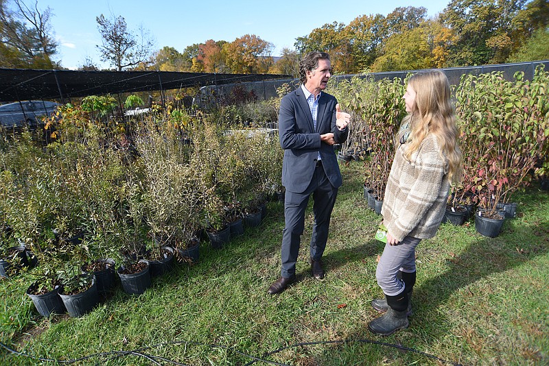 Staff photo by Matt Hamilton / Nursery manager Haley Hamblen, right, talks with Chattanooga Mayor Tim Kelly at Reflection Riding Arboretum and Nature Center on Friday, October 28, 2022.
