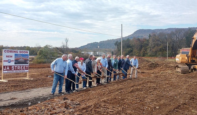 Staff photo by Mike Pare / Food City officials join with others from Kimball and Marion County, Tennessee, on Wednesday, Nov. 3, 2022, to break ground on a new supermarket. The 49,000-square-foot store is to be ready in eight or nine months, officials said.