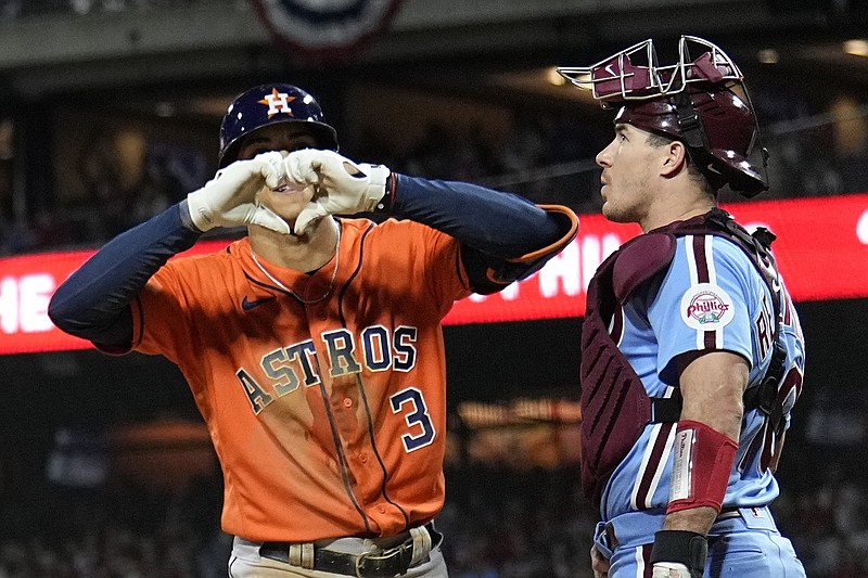 AP photo by Matt Slocum / The Houston Astros' Jeremy Pena celebrates his home run as Philadelphia Phillies catcher J.T. Realmuto stands by during the fourth inning in Game 5 of the World Series on Thursday night in Philadelphia.