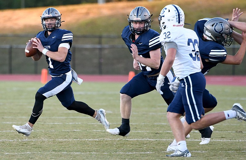 Staff photo by Robin Rudd / Coahulla Creek’s Kace Kinnamon rolls out against Gordon Lee. The senior is capping his third season as the team’s starting quarterback with the program’s first playoff appearance.