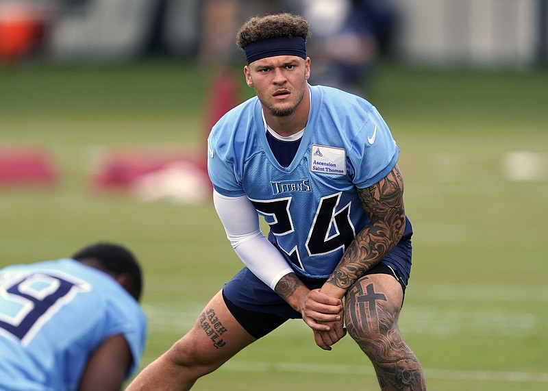 FILE - Tennessee Titans cornerback Elijah Molden (24) warms up during training camp at the NFL football team's practice facility July 28, 2022, in Nashville, Tenn. Molden remains on injured reserve and is in the 21-day window trying to return to the active roster. (AP Photo/Mark Humphrey, File)