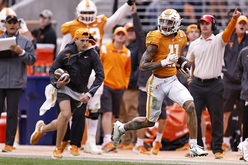 AP photo by Wade Payne / Tennessee receiver Jalin Hyatt sprints down the sideline on a 68-yard touchdown catch in the second half of Saturday’s home win against Missouri. Hyatt’s score at the 8:30 mark of the third quarter started a 38-0 run by the Vols to finish the game as they won 66-24.