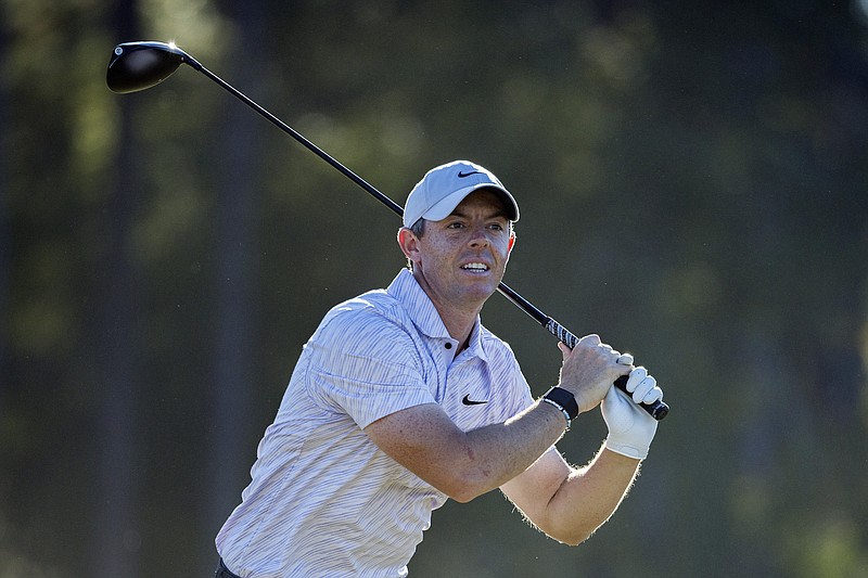 Rory McIlroy, of Northern Ireland, reacts to his drive off the 17th tee during the final round of the CJ Cup golf tournament Sunday, Oct. 23, 2022, in Ridgeland, S.C. (AP Photo/Stephen B. Morton)