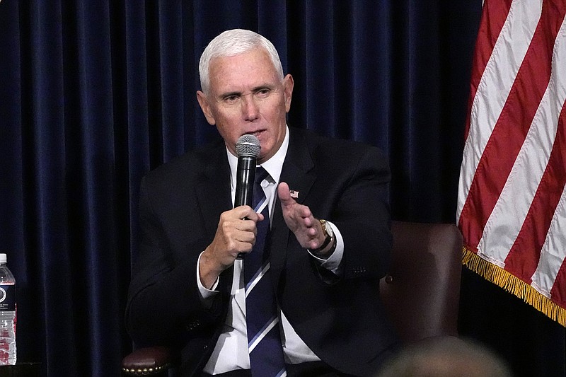 AP File Photo/Mark J. Terrill / Former Vice President Mike Pence has written a book about his time in the White House called "So Help Me God" and says he'll decide during the holidays what his future holds.