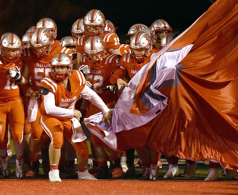 Staff photo by Matt Hamilton / Baylor football players take the field before a Nov. 11 home game against Memphis University School in the second of the TSSAA Division II-AAA playoffs.