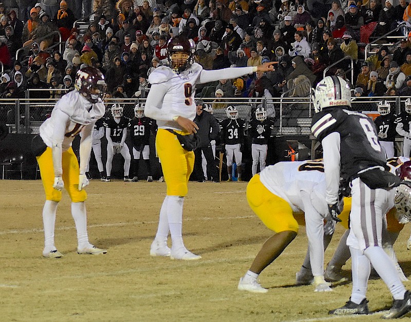 Staff photo by Patrick MacCoon / Tyner senior running back Markel McKinley, left, and quarterback Josh Jackson (9) wait on a play call from the sideline in Friday's TSSAA Class 2A quarterfinal against East Robertson in Cross Plains, Tenn.