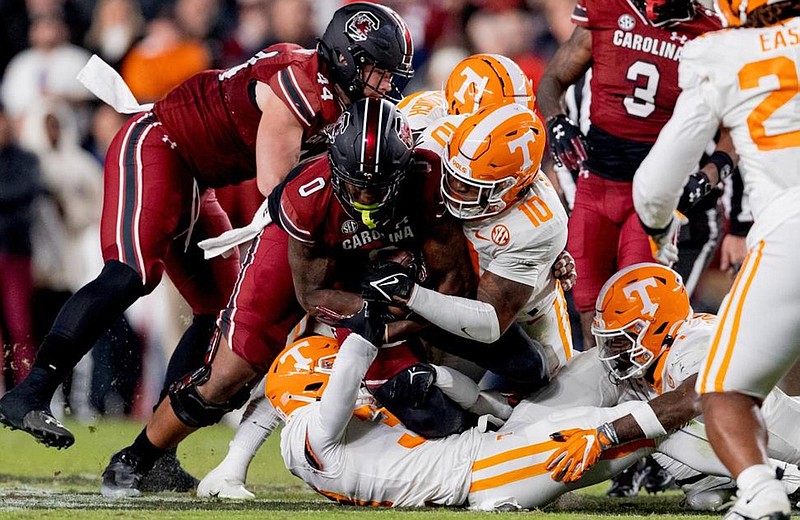 Tennessee photo by Andrew Ferguson / Linebacker Juwan Mitchell (10) and the Tennessee defense had a difficult time stopping tight end and running back Jaheim Bell (0) and the South Carolina offense during Saturday night’s 63-38 win by the Gamecocks.