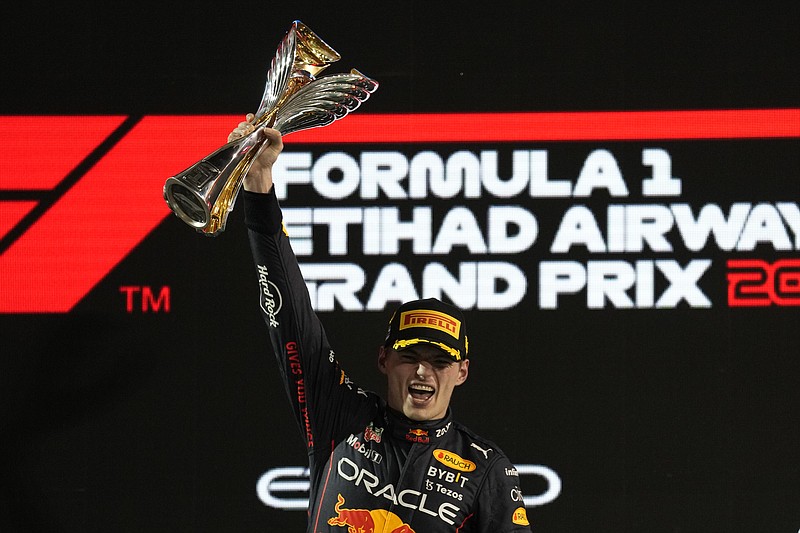 AP photo by Kamran Jebreili / Red Bull driver Max Verstappen celebrates after winning the Abu Dhabi Grand Prix on Sunday to close the Formula One season. He won for a record-extending 15th time.