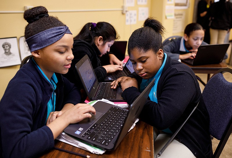 Staff File Photo / Students work on an activity during a sixth grade history class at Chattanooga Girls Leadership Academy, a local public charter school, on Thursday, April 11, 2019.