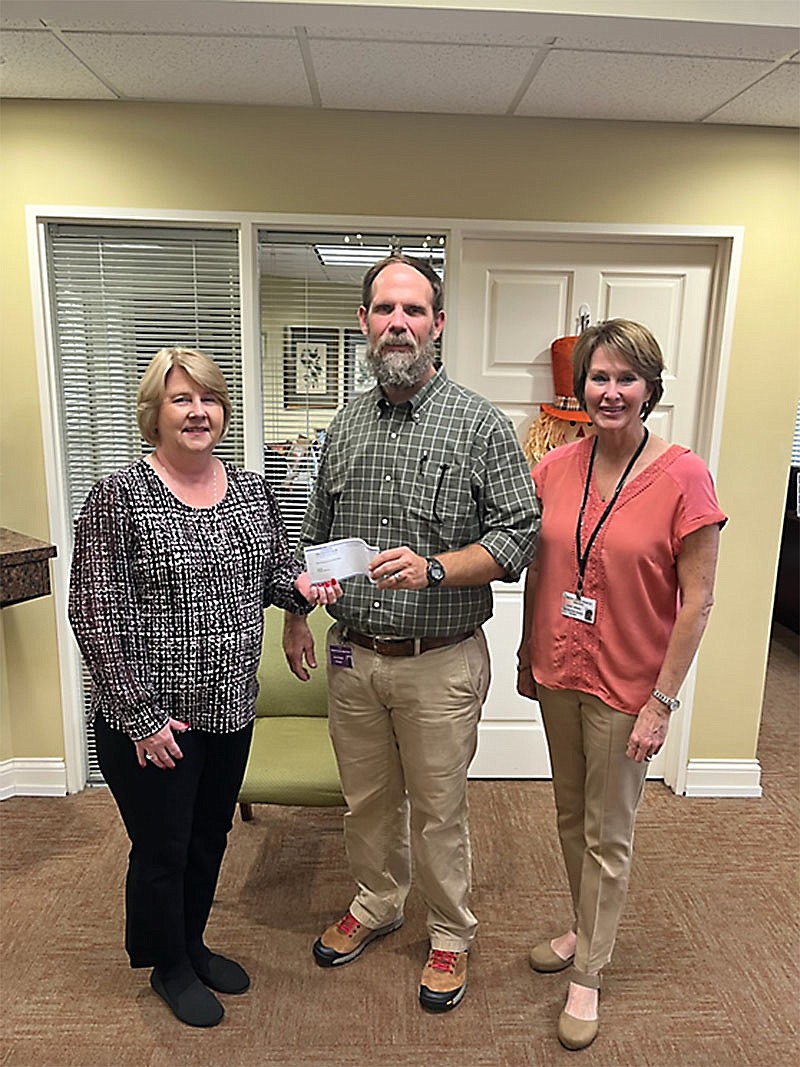 Contributed photo / From left are Carol Long, manager of Citizens Tri-County Bank; Dr. Larry Ziegler, principal of Marion County High School; and Carol Bailey, director of coordinated school health for Marion County Schools.