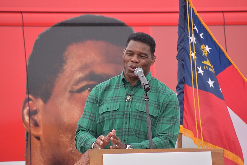 Staff Photo By Andrew Wilkins / U.S. Senate candidate Herschel Walker speaks to a crowd at a stop in Ringgold, Ga., during the general election campaign.