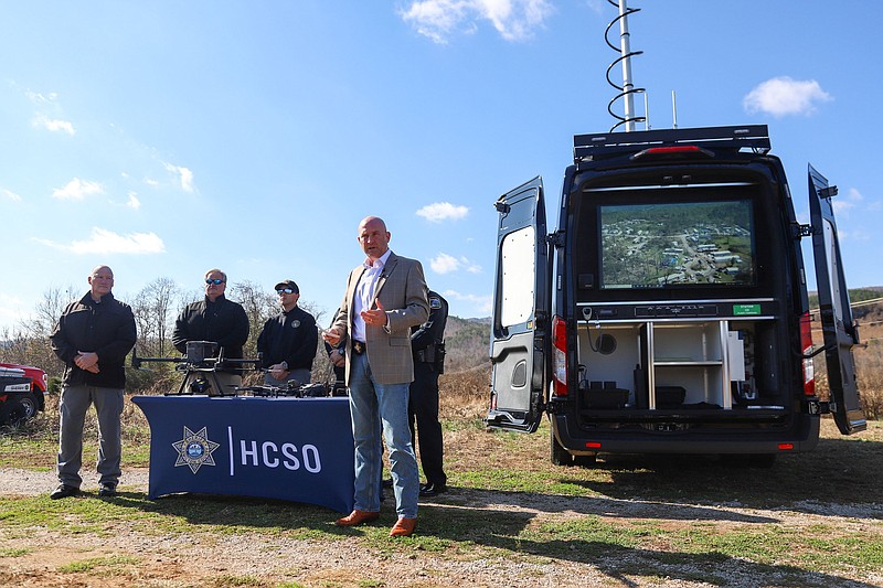 Staff photo by Olivia Ross  / Hamilton County Sheriff Austin Garrett talks with members of the media on Nov. 16 near Old McDonald's Farm in Sale Creek. The Hamilton County Sheriff's Office unveiled the new Unmanned Aerial Systems Command Vehicle. According to the Sheriff's Office, the vehicle allows pilots to work with the drones in "multiple workstations in a controlled environment."