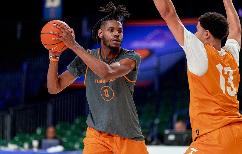 Tennessee Athletics photo / Jonas Aidoo looks to pass around Olivier Nkamhoua during a Tennessee practice for the Battle 4 Atlantis tournament in the Bahamas.