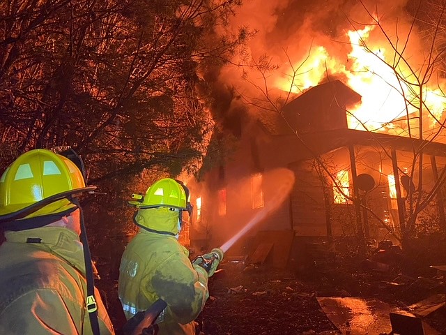 Firefighters battle a blaze early Wednesday that destroyed a home in the 6500 block of Cooley Road in Harrison, Tennessee. / Photo by Highway 58 Volunteer Fire Department Training Chief Nick Wilson
