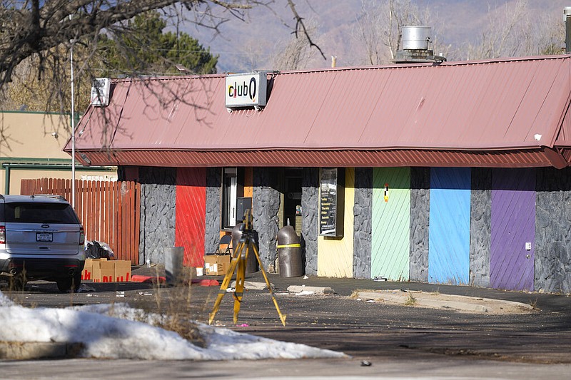 The door to Club Q is open as investigators continue to collect evidence after a mass shooting at the gay nightclub Wednesday in Colorado Springs, Colo.  The alleged shooter facing possible hate crime charges in the fatal shooting of five people at a Colorado Springs gay nightclub is scheduled to make their first court appearance Wednesday from jail after being released from the hospital a day earlier.  (AP Photo/David Zalubowski)