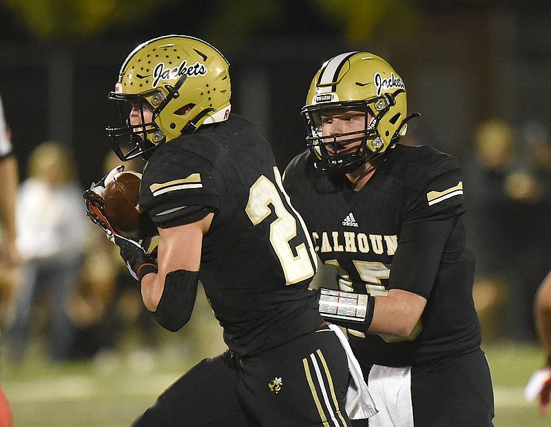 Staff photo by Matt Hamilton / Calhoun stars Trey Townsend, right, and Caden Williams have overcome injuries to help lead the Yellow Jackets to Friday's GHSA Class AAAAA quarterfinal game at Ware County.