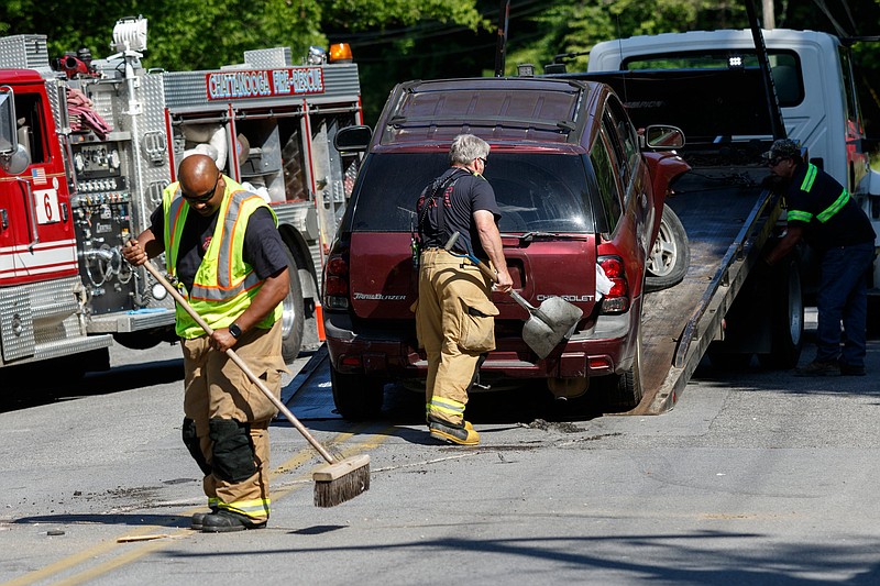 Staff Photo / A wrecked Chevrolet Trailblazer is loaded onto a tow truck in 2019 after a crash on New York Avenue in Chattanooga.