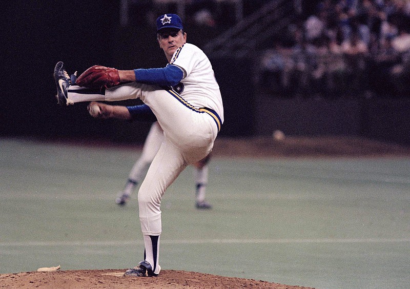AP photo by Barry Sweet / Seattle Mariners pitcher Gaylord Perry delivers to the plate during a 7-3 home win over the New York Yankees on May 6, 1982. It was the 300th win of a 21-year MLB career in which Perry went 314-265, leading to his 1991 induction into the National Baseball Hall of Fame.