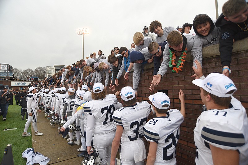 Staff photo by Matt Hamilton / Anderson County football players line up to thank their fans after their win against Pearl-Cohn in the TSSAA Class 4A BlueCross Bowl state championship game Saturday at Finley Stadium.