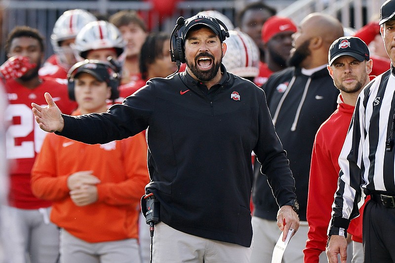 AP file photo by Jay LaPrete / Ohio State football coach Ryan Day and the Buckeyes must begin preparing for a Peach Bowl matchup with Georgia on New Year's Eve after being selected Sunday as the No. 4 seed for the College Football Playoff.