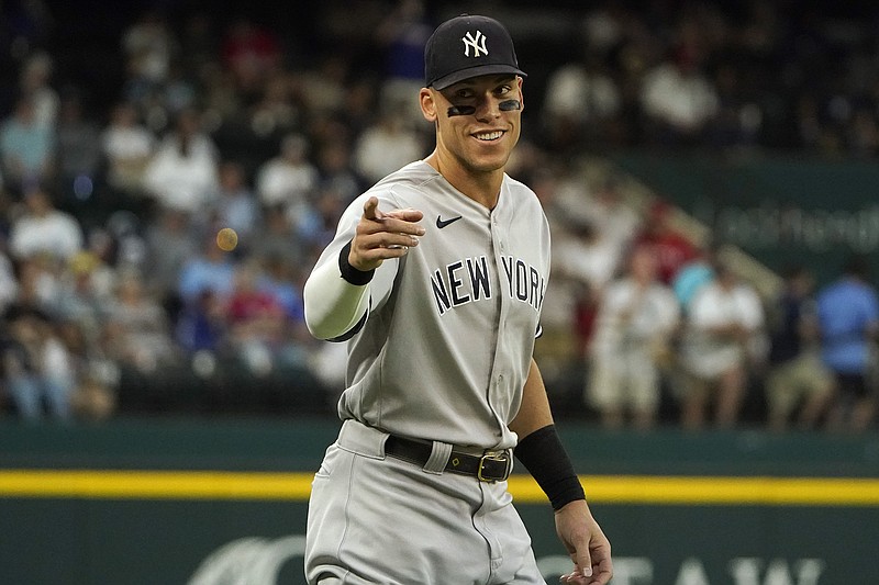 AP file photo by LM Otero / New York Yankees outfielder Aaron Judge, after hitting an AL-record 62 home runs on the way to being named league MVP this past season, has returned to the team on a record-setting deal after exploring free agency.