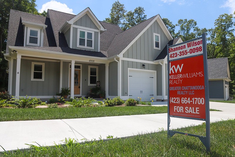 Staff photo by Olivia Ross  / A For Sale sign sits in a Signal Mountain home's lawn on August 15, 2022.