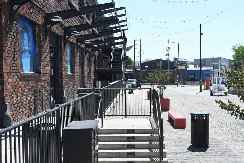 Staff Photo by Robin Rudd / Station Street, with the Blue Light Bar and Grill at left, is seen on June 20, the day after a shooting near Station Street and the Chattanooga Choo Choo, left two people injured.