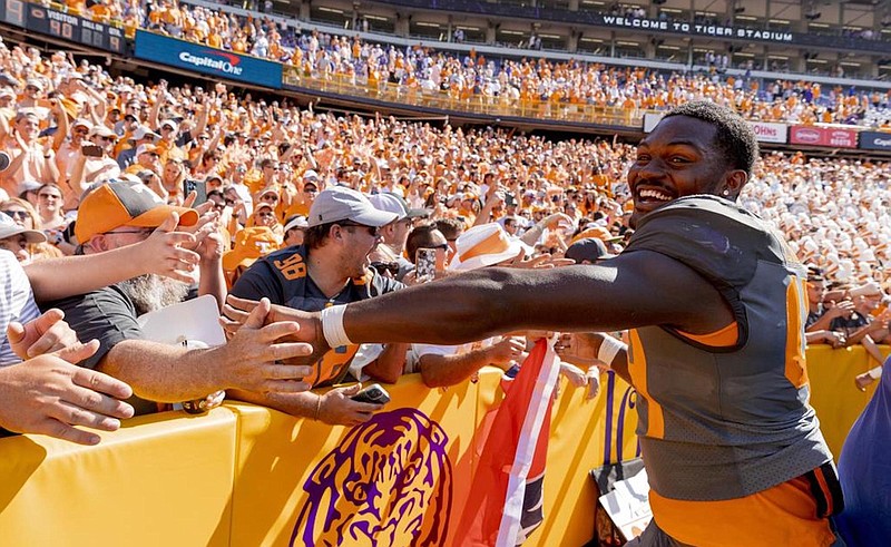 Tennessee Athletics photo / Tennessee freshman linebacker Elijah Herring celebrates with fans after the Volunteers in their Smokey Grey uniforms routed LSU 40-13 inside Tiger Stadium.