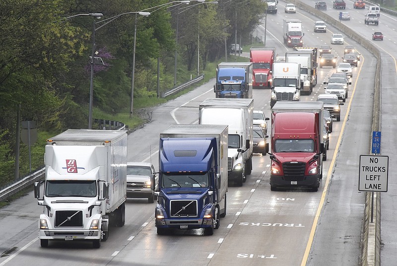 Staff file photo / Westbound Interstate 24 trucks climb toward the top of Missionary Ridge to deliver necessities for consumers. The Chattanooga area has gained the nickname of "freight alley" due to its concentration of logistics and trucking companies.