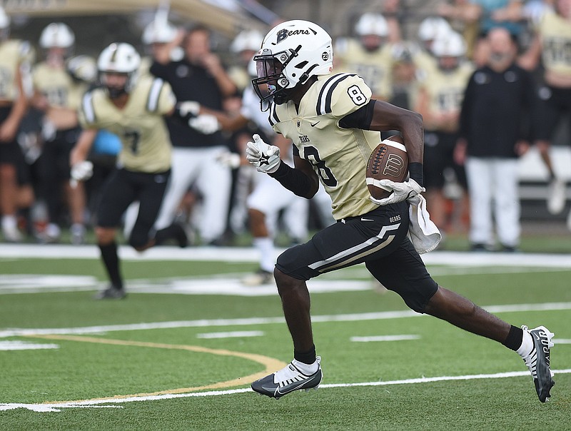 Staff photo by Matt Hamilton /  Bradley Central (8) Marcus Goree Jr. runs for a touchdown after a catch against Walker Valley at Bradley Central High School in Cleveland on Friday, August 26, 2022.