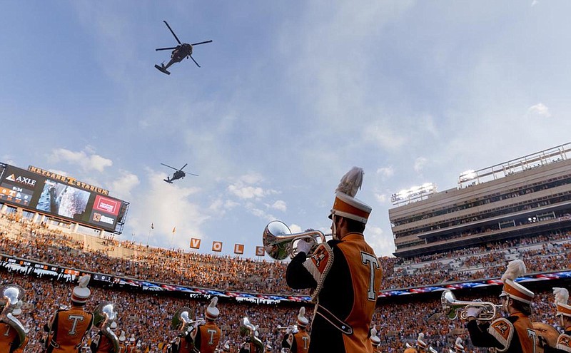 Tennessee Athletics photo by Andrew Ferguson / Blackhawk helicopters fly over Neyland Stadium before Tennessee’s season opener Sept. 1 against Ball State.