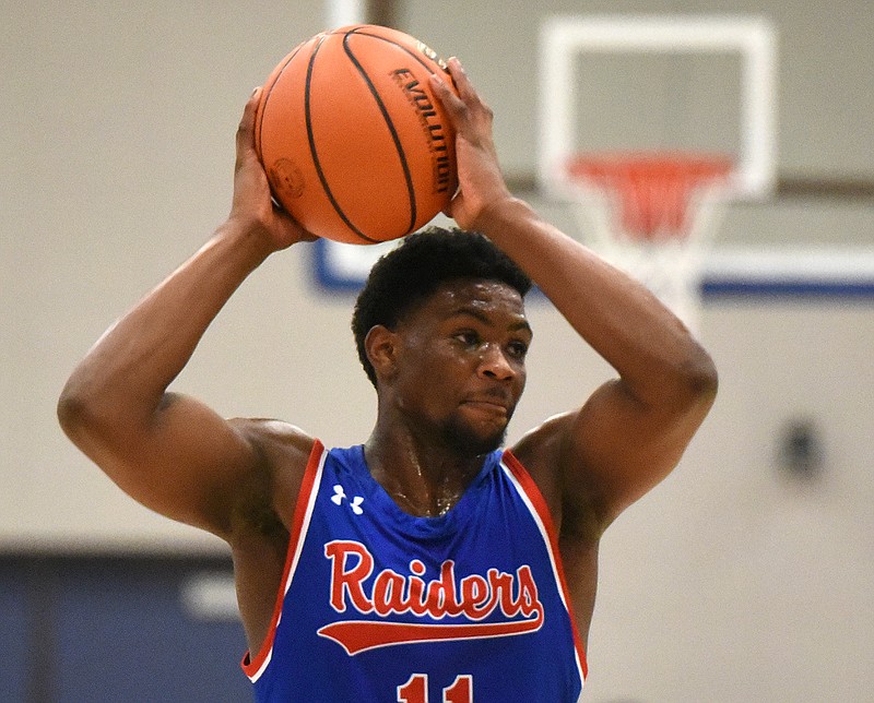 Staff photo by Matt Hamilton / Cleveland (11) Jasen Brooks looks for an outlet during a game against East Hamilton on Thursday, December 22, 2022 at Chattanooga State Community College.