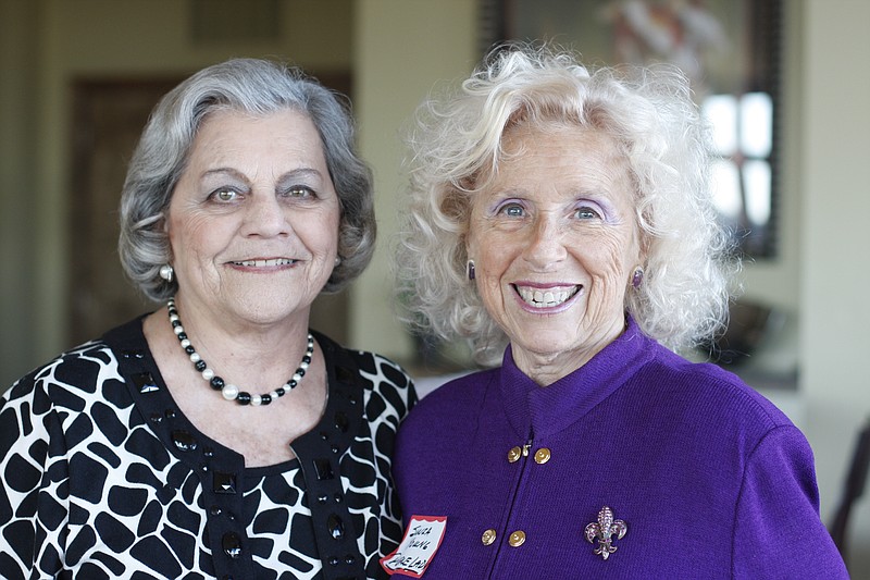 Staff Photo / On Feb. 8, 2011, at the reception for the 2011 class of Women of Distinction, Bobbie Abercrombie, left, and Sonia Young smile for a photograph.