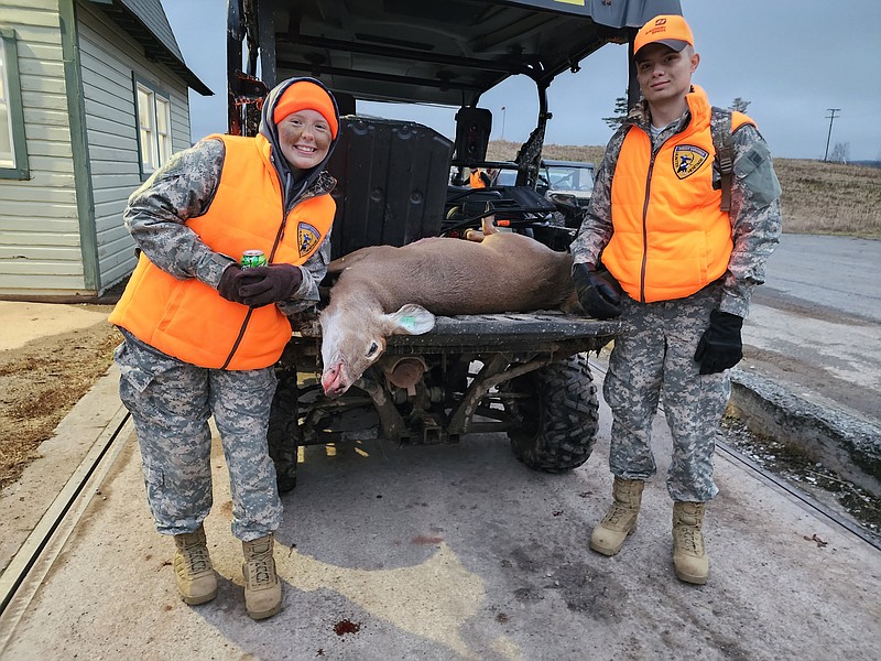 Photo contributed by Larry Case / Mileena McCallister, left, and Dakota Kelly, cadets from the Mountaineer Challenge Academy-South, pose with the deer McCallister killed during a recent special event hunt involving the West Virginia Department of Natural Resources Law Enforcement Section.