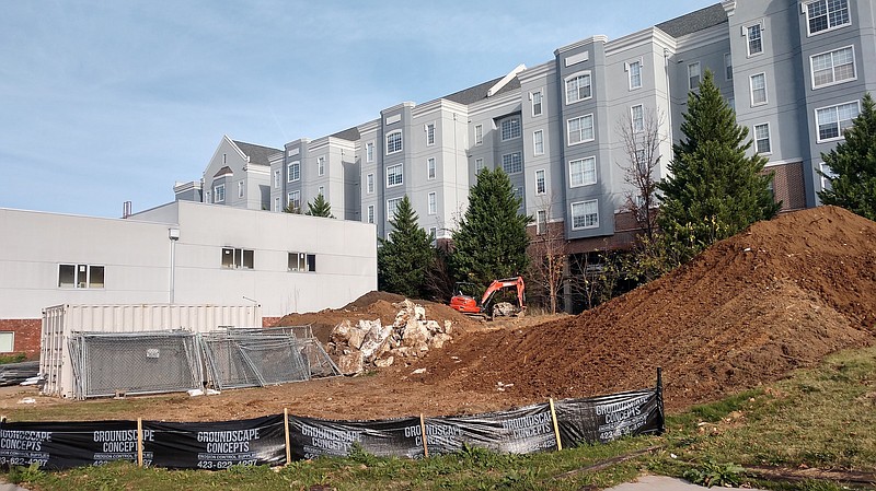 Staff Photo by Mike Pare / A vacant lot at 621 E. M.L. King Blvd., near UTC, shows work going on Nov. 10 for a new apartment complex. The site will hold 24 units of affordable housing.