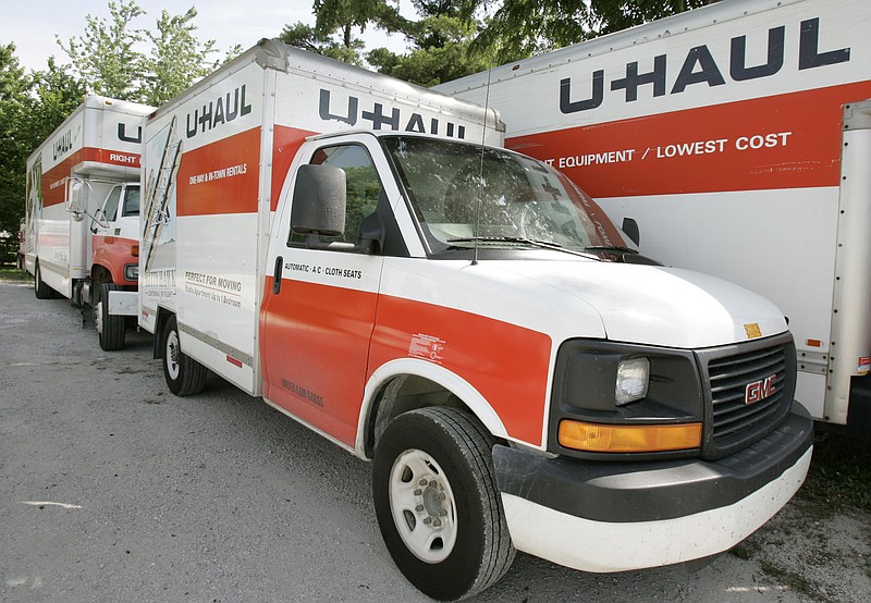 AP Photo by Charlie Neibergall / Shown are U-Haul trucks on a dealer lot in 2006, in Des Moines, Iowa. Tennessee and neighboring Georgia, Virginia and the Carolinas all remain among the top 10 states where more people relocated to last year using one-way U-Haul trailers.