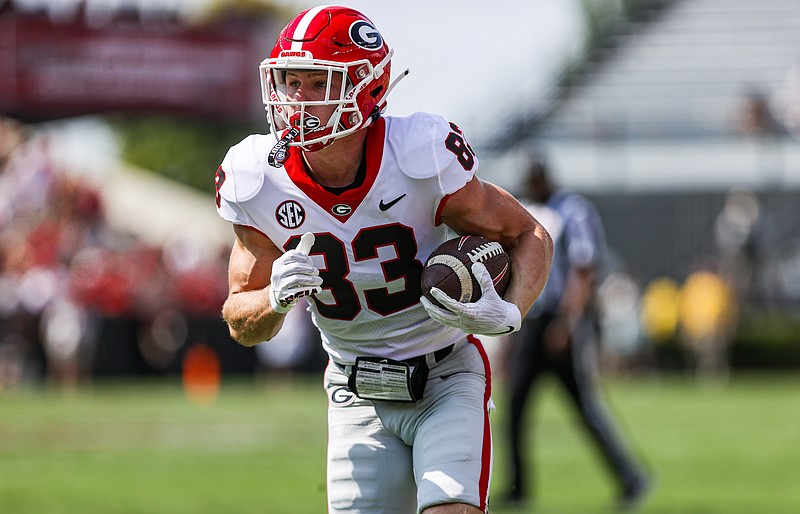 Georgia photo by Tony Walsh / Georgia freshman receiver Cole Speer looks for running room during a 12-yard catch at South Carolina on Sept. 17.