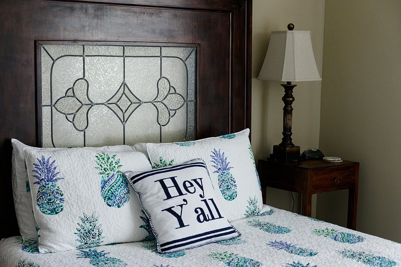 Staff Photo / A pillow that reads "Hey Y'all" is pictured in 2019 in a home managed by short-term rental management company Chattanooga Vacation Rentals. The Hamilton County Commission on Wednesday voted to extend a moratorium on new permits for short-term vacation rentals in unincorporated parts of the county until March 1.