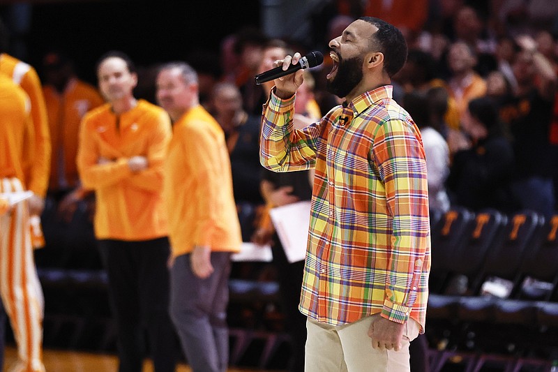 AP photo by Wade Payne / Former University of Tennessee basketball player Chris Lofton yells as he encourages fans to get loud before the Vols' game against SEC rival Kentucky on Saturday in Knoxville. Lofton, who played for the Vols from 2004-08, was honored by Tennessee as the program retired his No. 5 jersey.