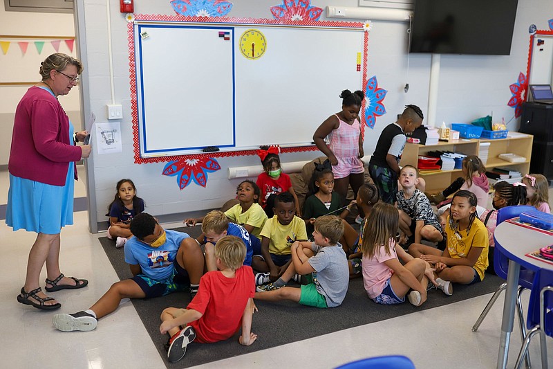 Staff Photo by Olivia Ross  / Cynthia Davidson's class at Chattanooga School for the Liberal Arts sits as a group and works Aug. 10. A member of the Tennessee Senate has filed legislation that would do away with maximum class sizes in state public schools.