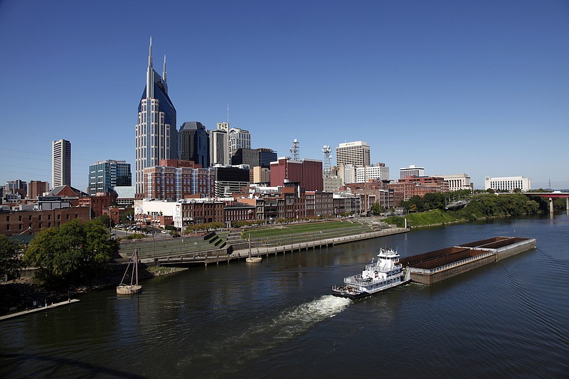 File photo/Mark Humphrey/The Associated Press / The Nashville, Tenn., downtown area and the Cumberland River are shown on Sept. 27, 2011.