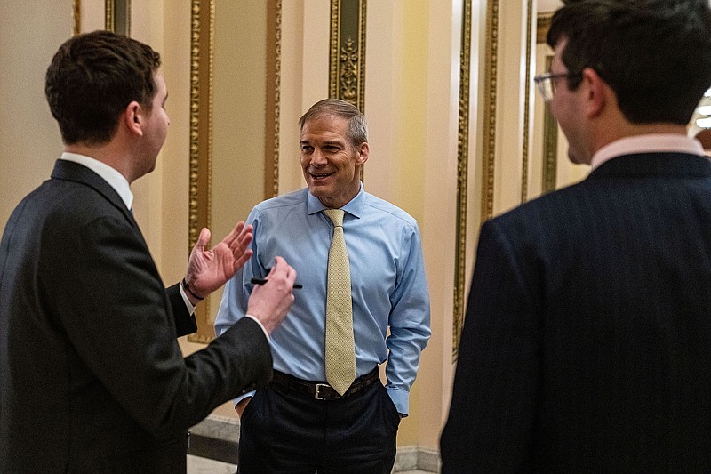 Photo/Haiyun Jiang/The New York Times / Rep. Jim Jordan, R-Ohio, talks with aides on Capitol Hill in Washington on Tuesday, Jan. 10, 2023.