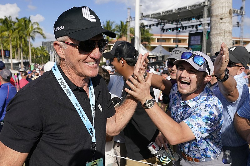 AP file photo by Lynne Sladky / LIV Golf CEO Greg Norman, left, said the second-year tour's announcement of a TV partnership with the CW Network made Thursday a "momentous day" and another step forward by the fledgling circuit.