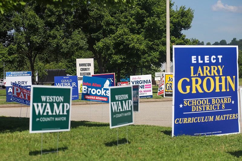 Staff File Photo By Olivia Ross  / Campaign signs line the roads leading to the Hamilton County Election Commission on July 15, 2022, ahead of the Aug. 4, 2022, county general and state and federal primary elections.