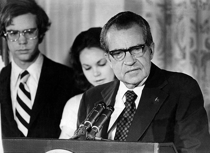 File photo/Mike Lien/The New York Times / President Richard Nixon bids farewell to his Cabinet and staff at the White House in Washington after his resignation on Aug. 9, 1974.
