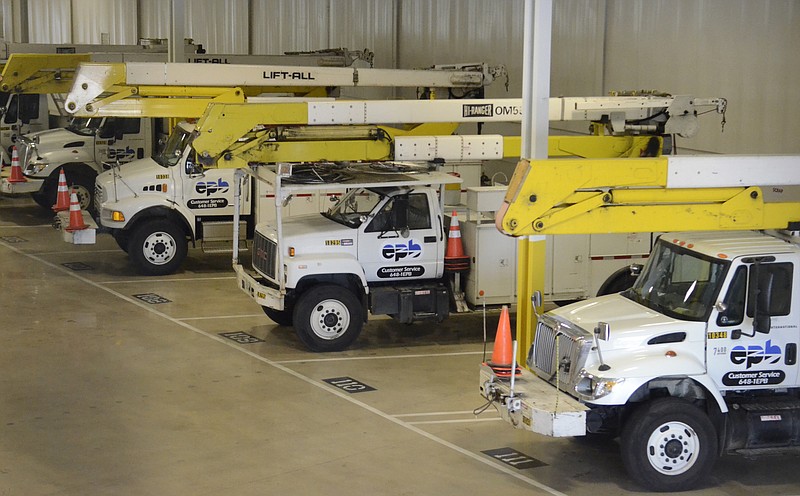 Staff Photo / Trucks are parked in 2012 inside one of the buildings at the EPB operations center at the former Cavalier site on Central Avenue under the Bailey Avenue overpass.