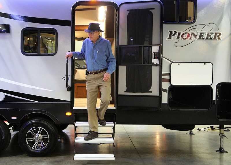 Staff file photo / Joe Noble exits a Pioneer camper during the 2018 Chattanooga RV Show at the Chattanooga Convention Center. The 2023 show is Feb. 10-12.