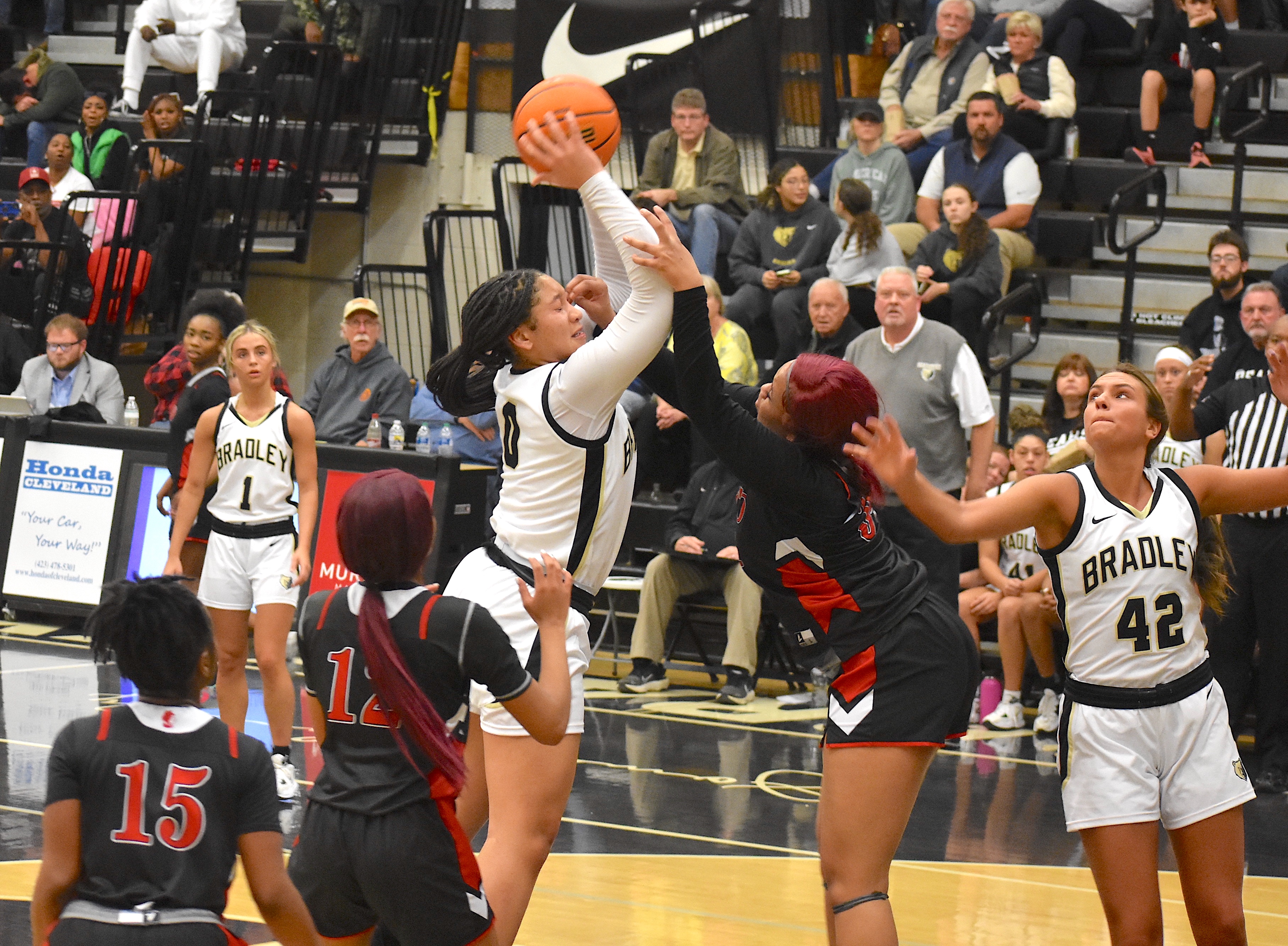 Staff photo by Patrick MacCoon / Bradley Central's Kimora Fields, center, fights for a rebound during Saturday's 74-43 home victory over Lakeview-Fort Oglethorpe.